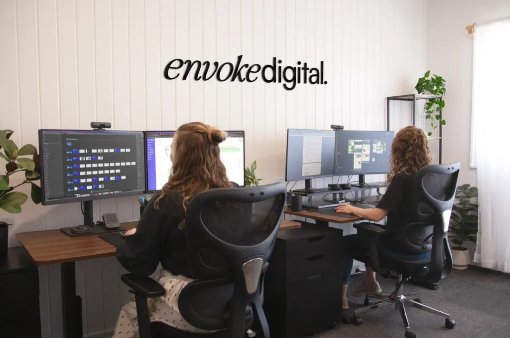 Employees working on computers at Envoke Digital office in Bundaberg